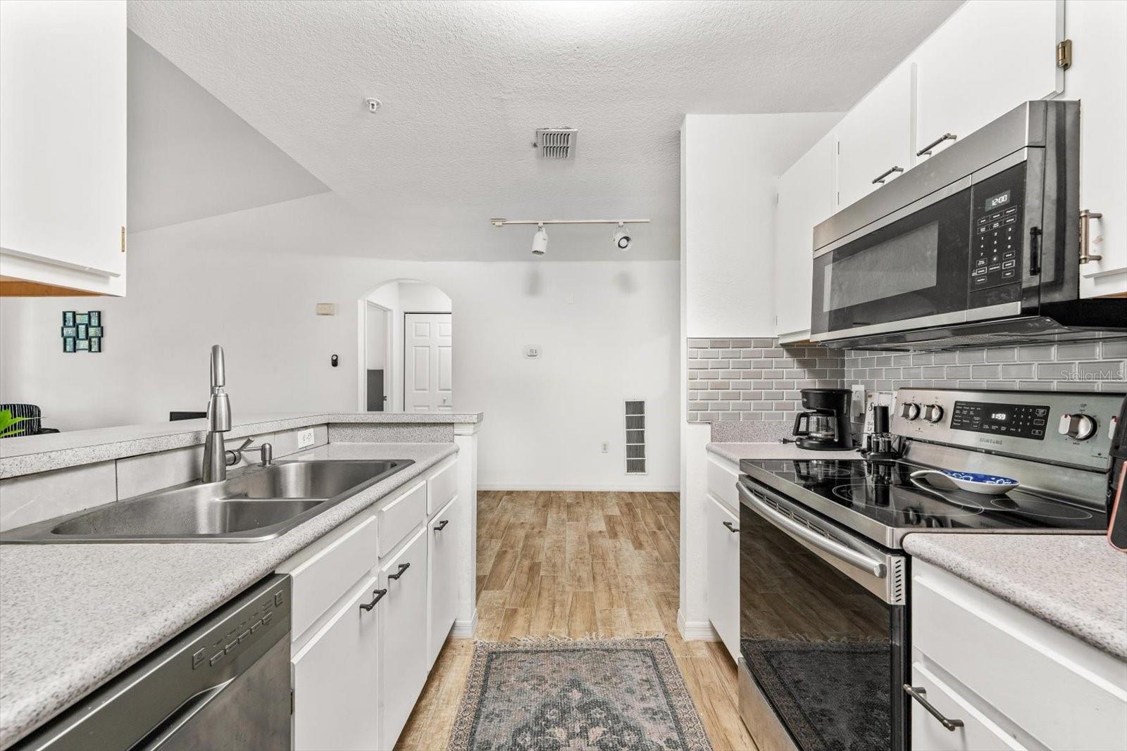 8933 MANOR LOOP #204 — photo 20