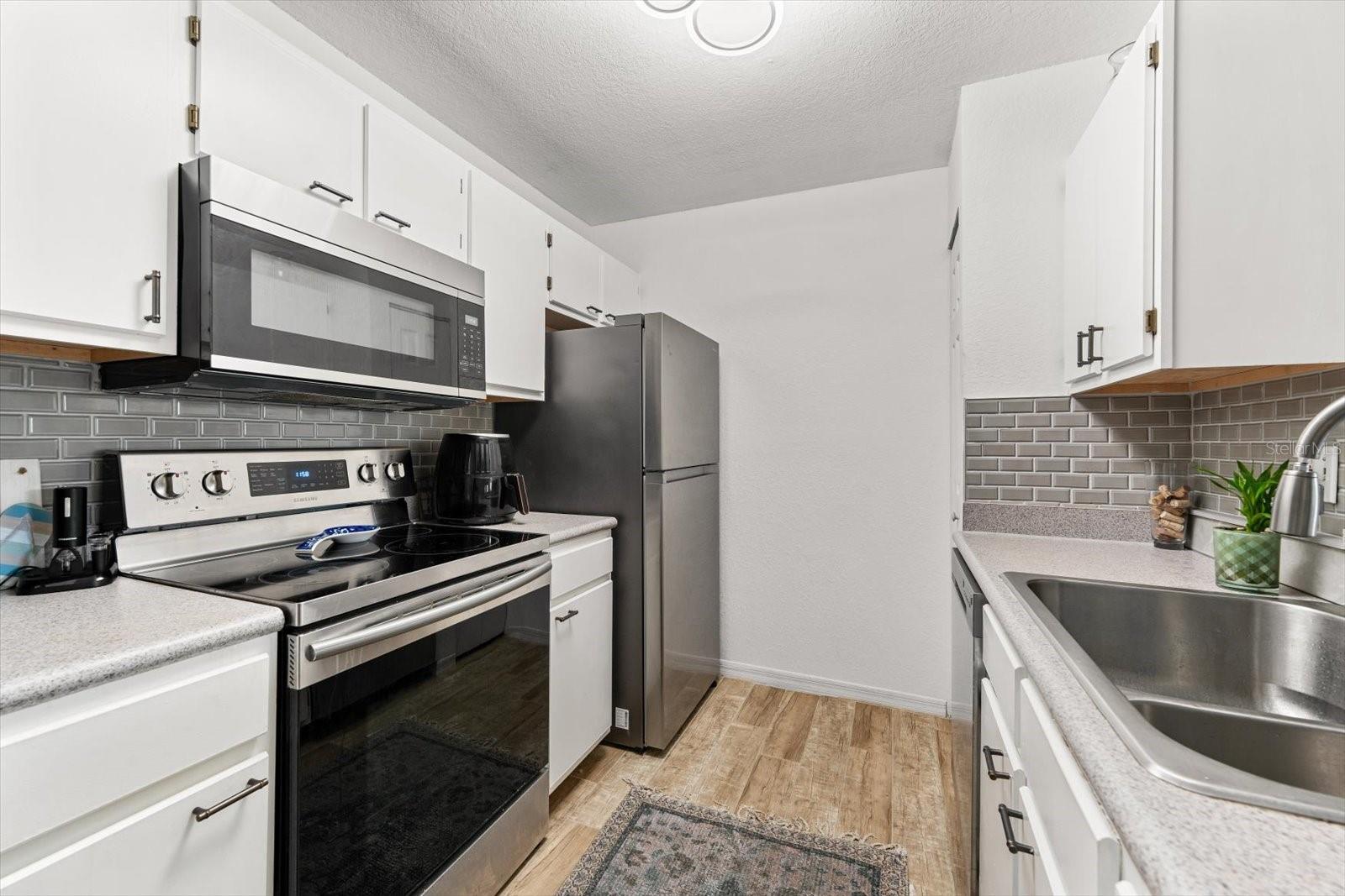 8933 MANOR LOOP #204 — photo 19