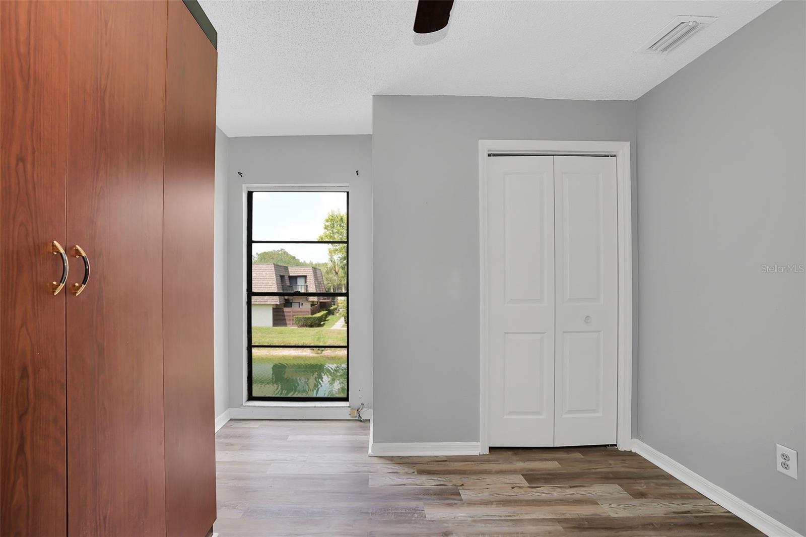 15217 W POND WOODS DR — photo 32
