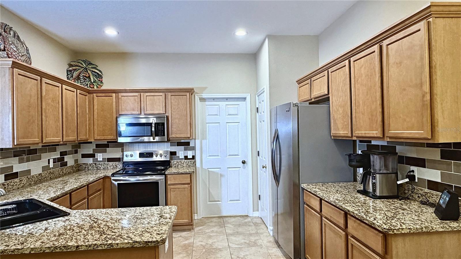 8240 ACADIAN LN — photo 38