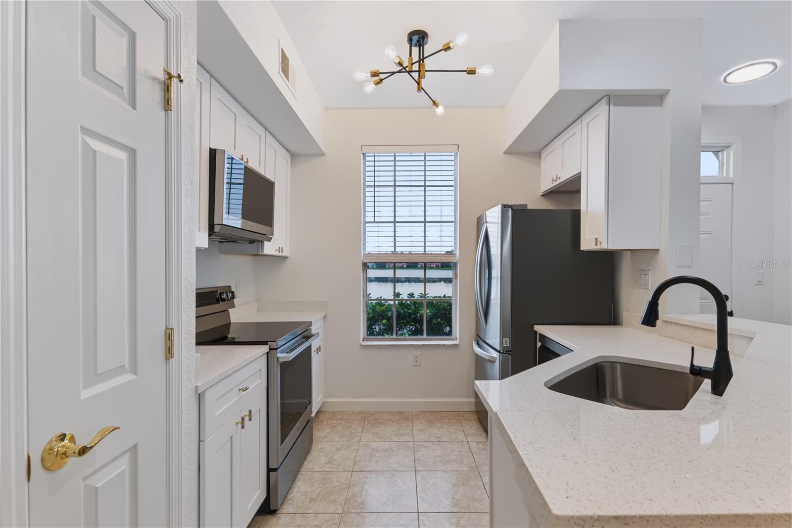 9818 LAKE CHASE ISLAND WAY #9818 — photo 5
