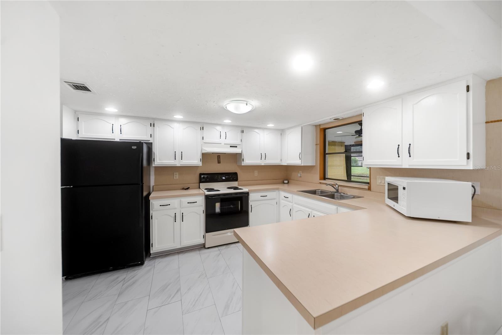 112 WOODINGHAM DR — photo 4
