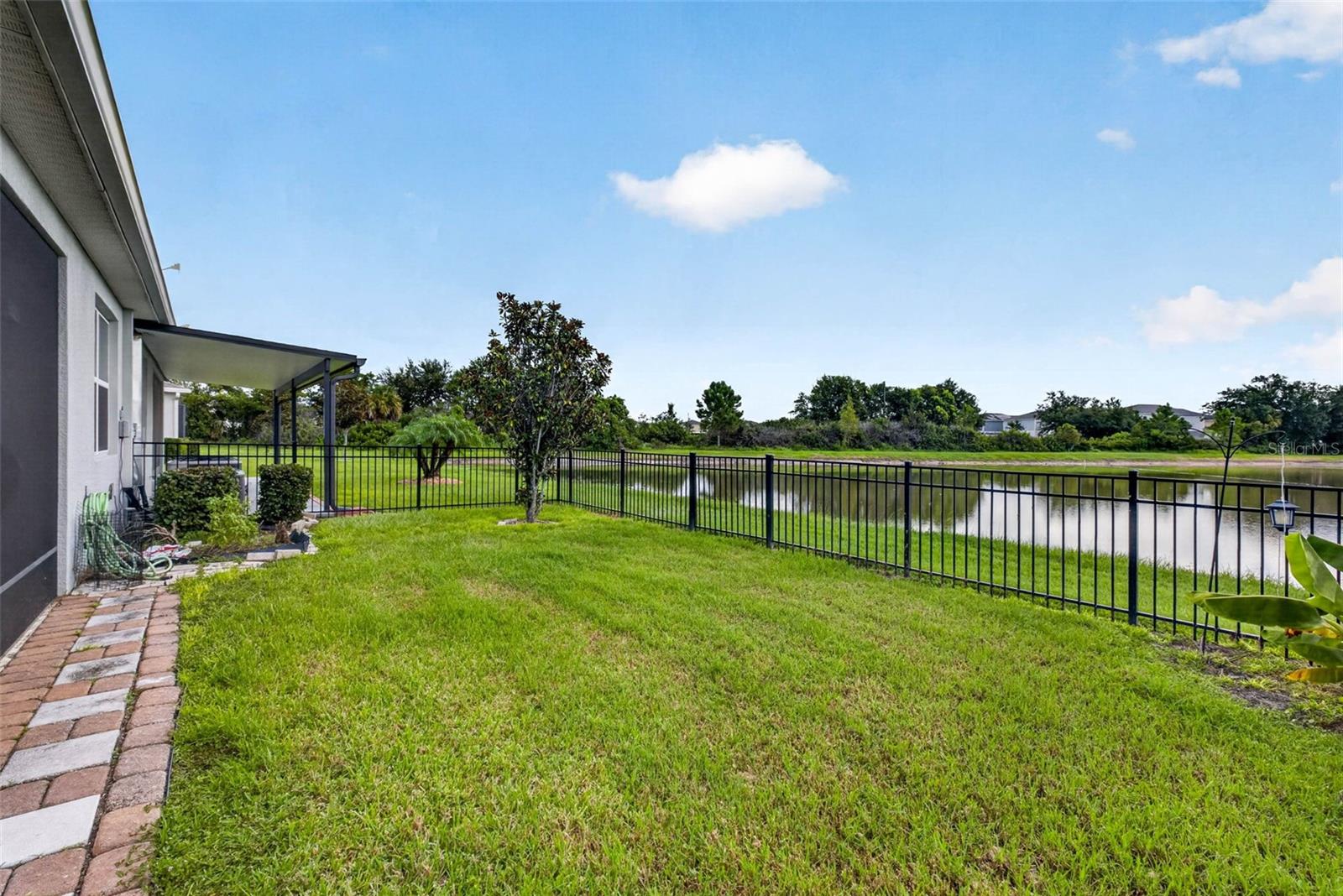 7460 STONEBROOK CIR — photo 3