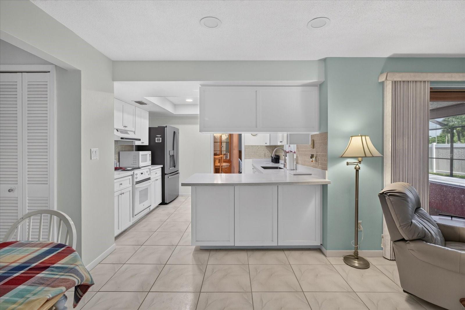 13497 OVAL DR E — photo 32