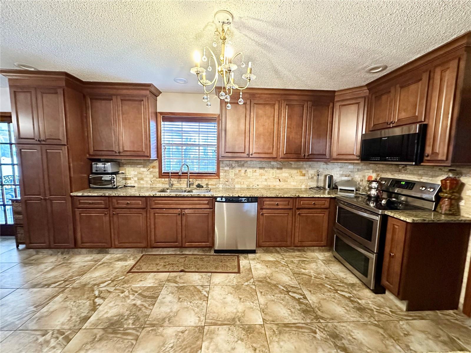 8834 WHISPERING OAKS TRL — photo 8