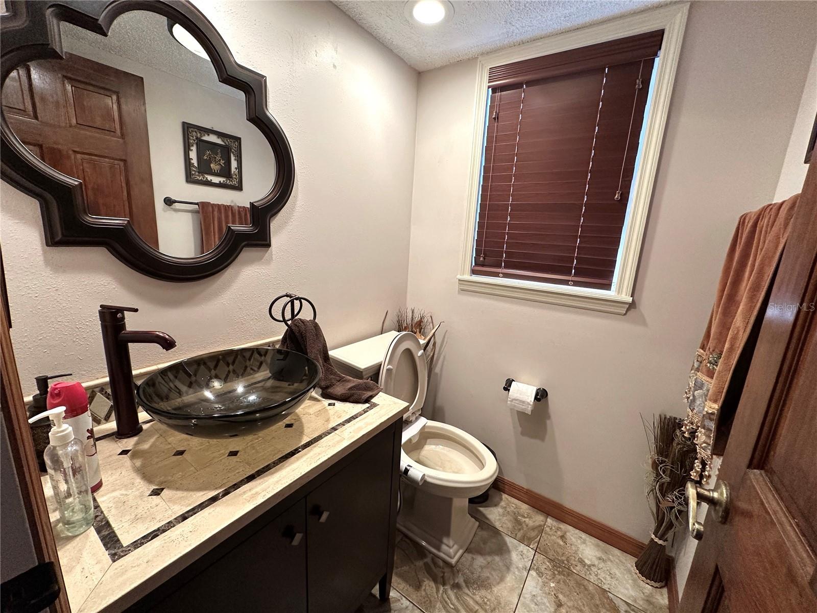 8834 WHISPERING OAKS TRL — photo 19