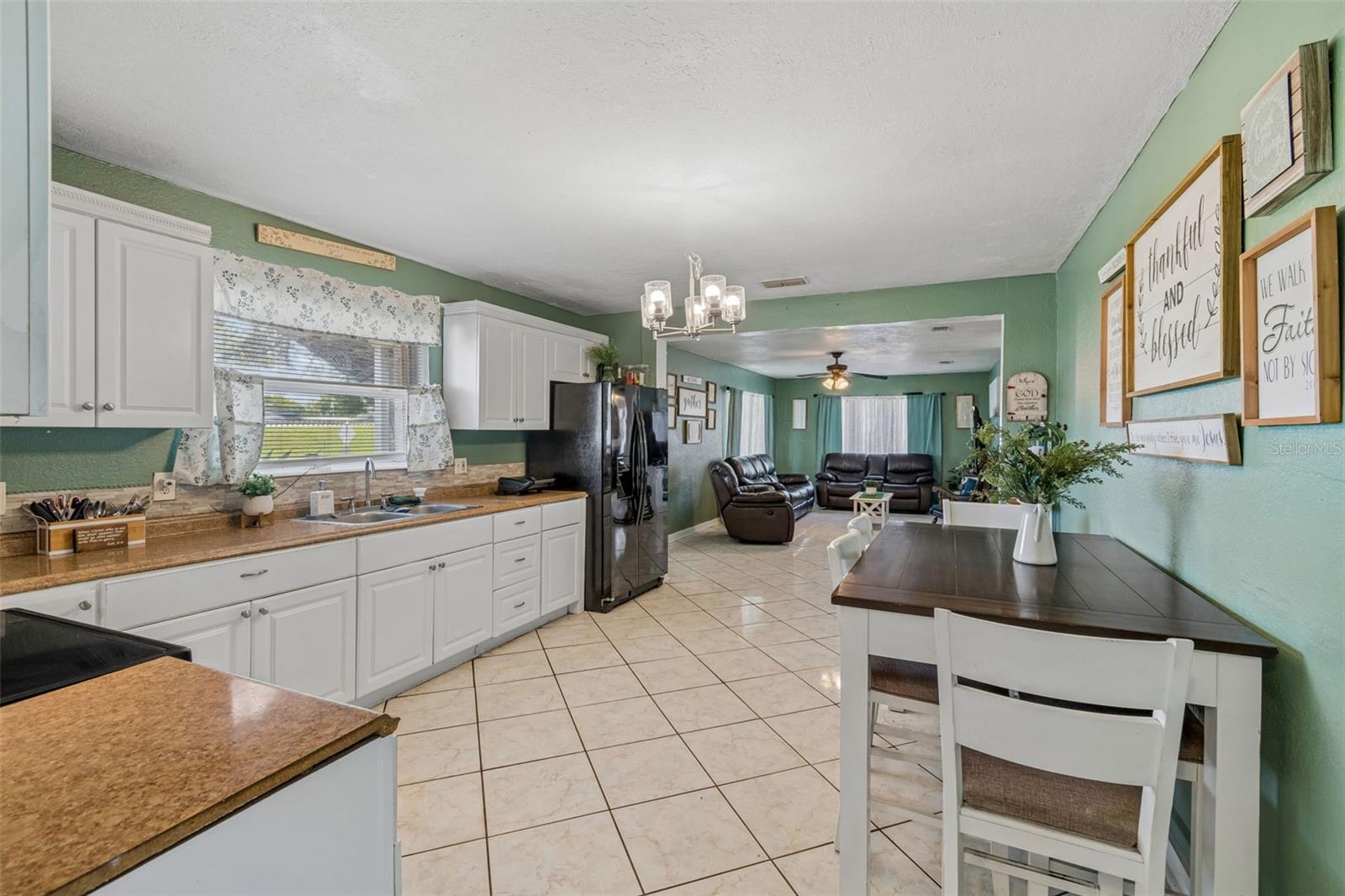 7307 N HUNTLEY AVE — photo 9