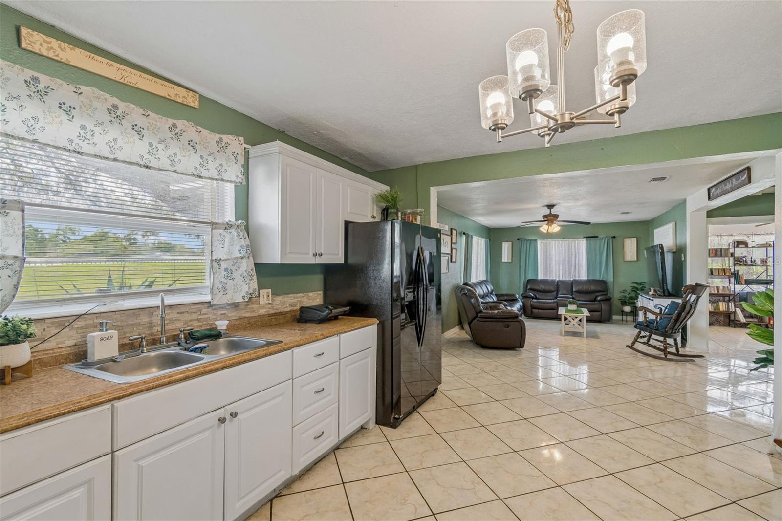 7307 N HUNTLEY AVE — photo 10