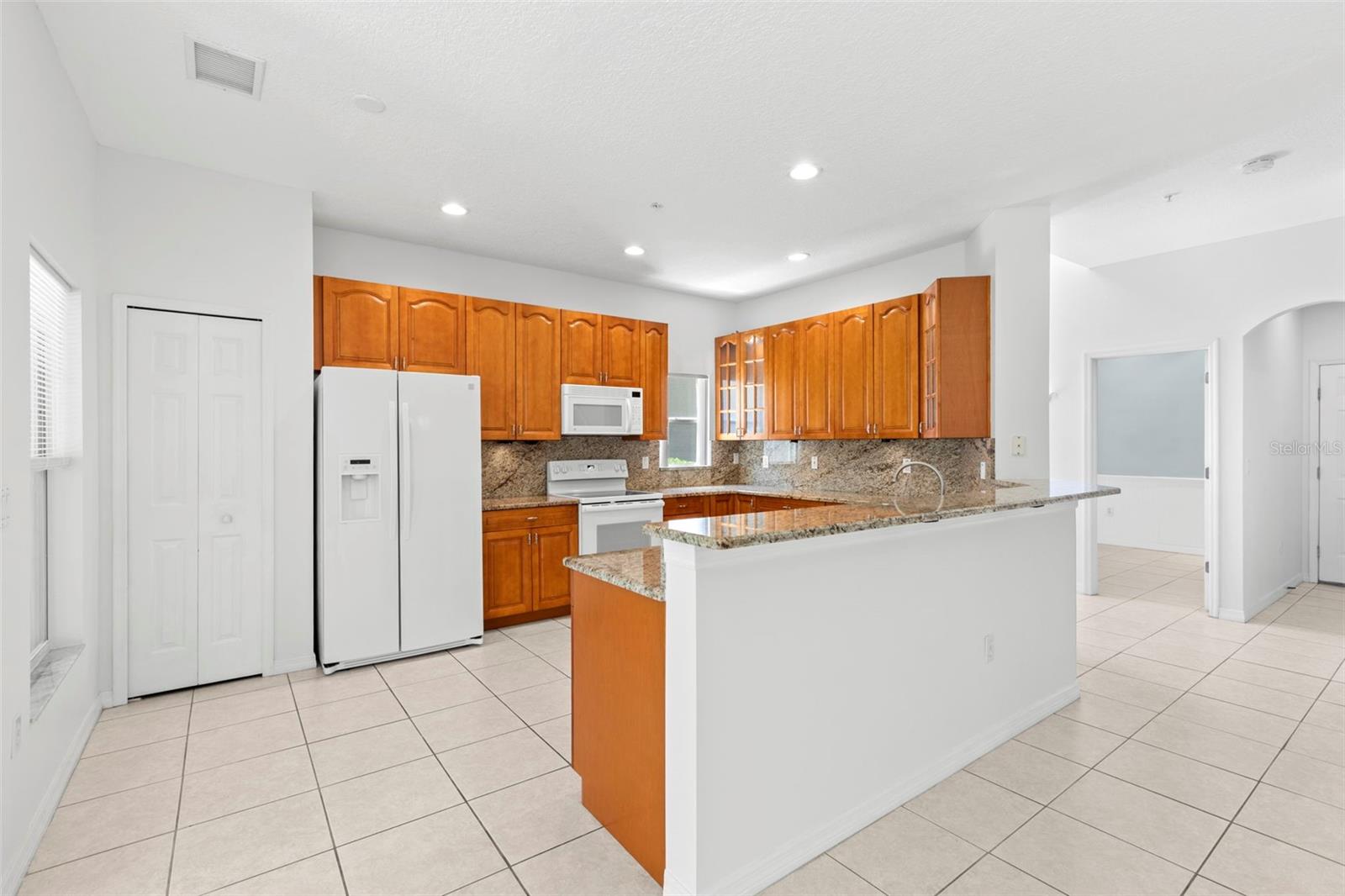 11117 KAPOK GRAND CIR — photo 10