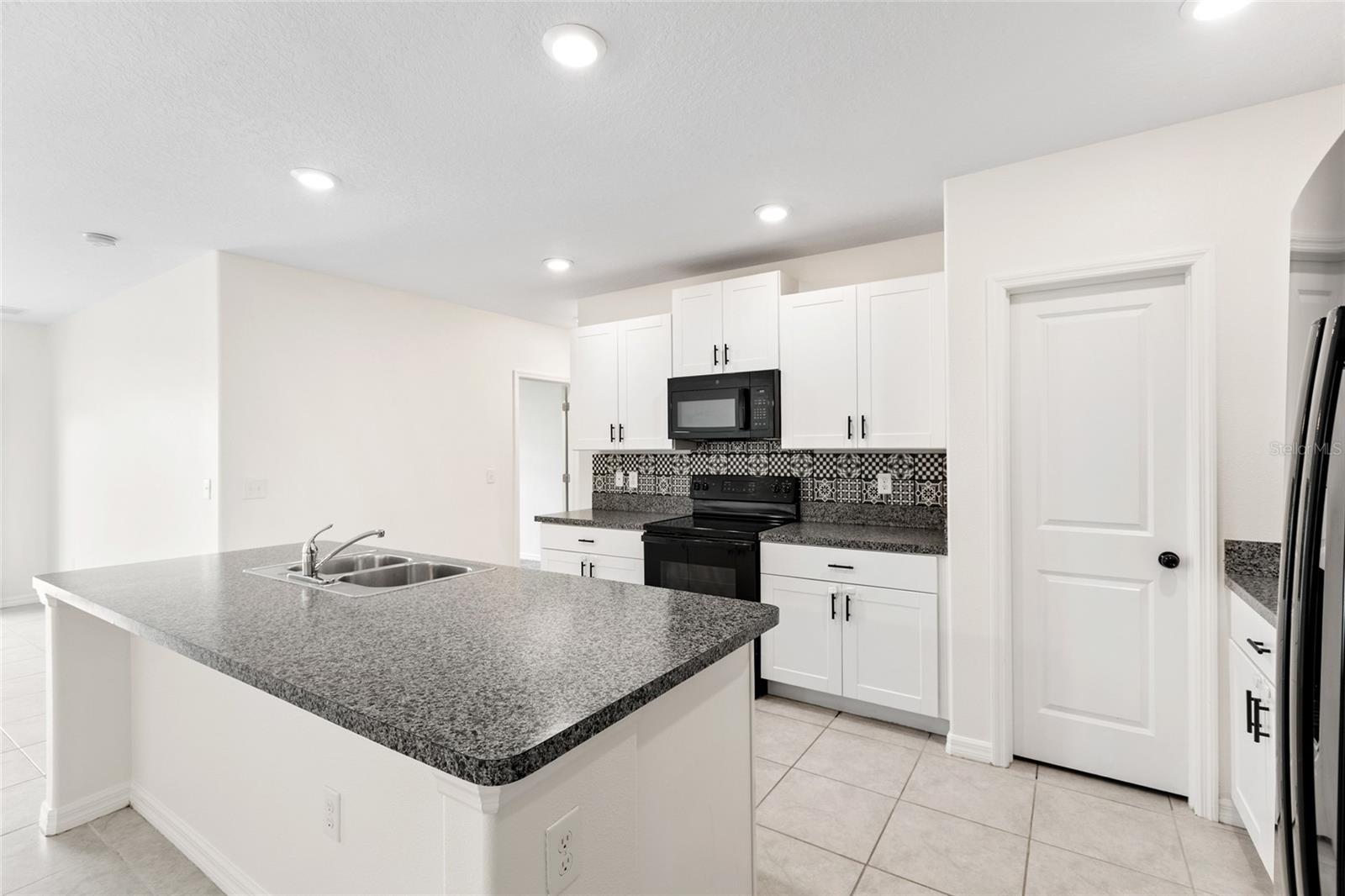 7310 PEARLY EVERLASTING AVE — photo 14