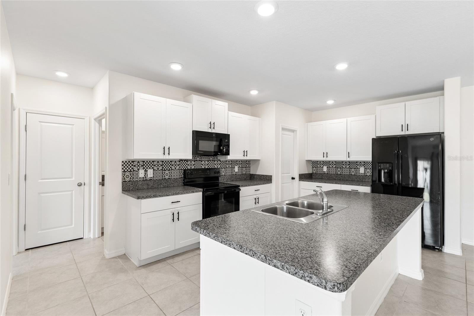7310 PEARLY EVERLASTING AVE — photo 10