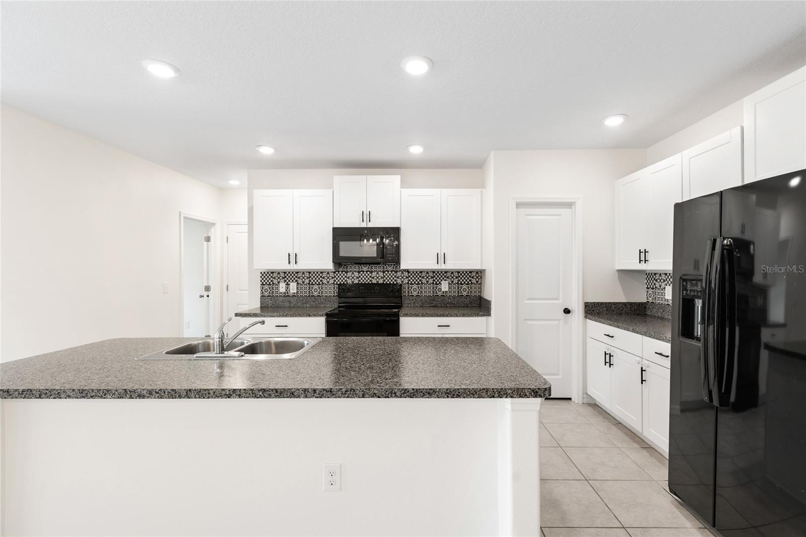 7310 PEARLY EVERLASTING AVE — photo 13
