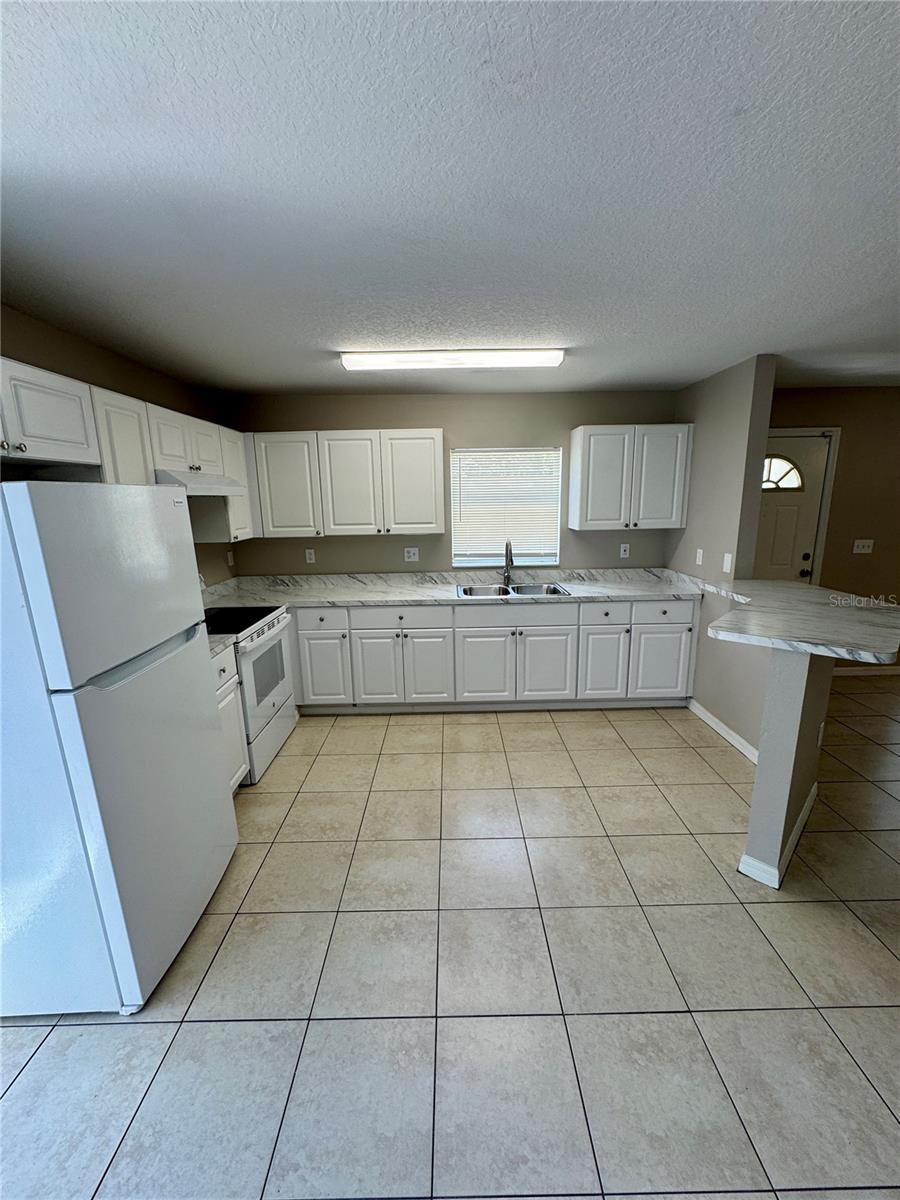 3305 E 38TH AVE — photo 9