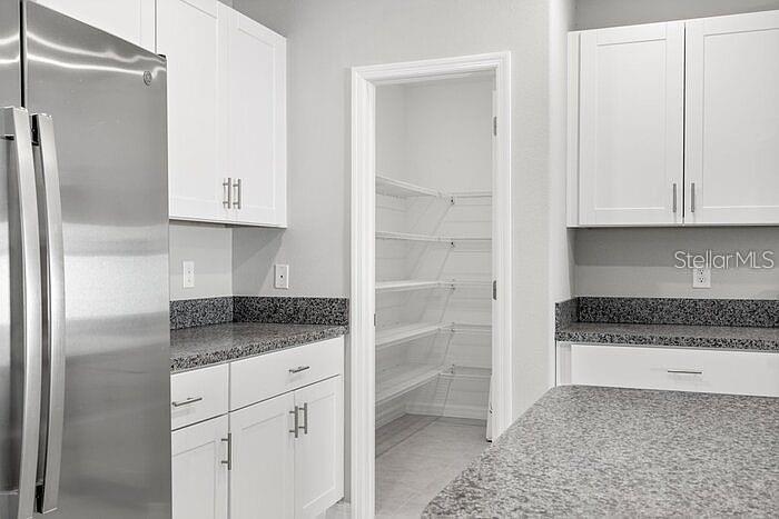 7222 RONNIE GARDEN CT — photo 20