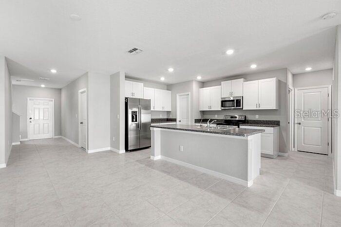 7222 RONNIE GARDEN CT — photo 25