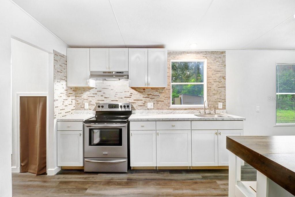 12610 ALEMEDO AVE — photo 14