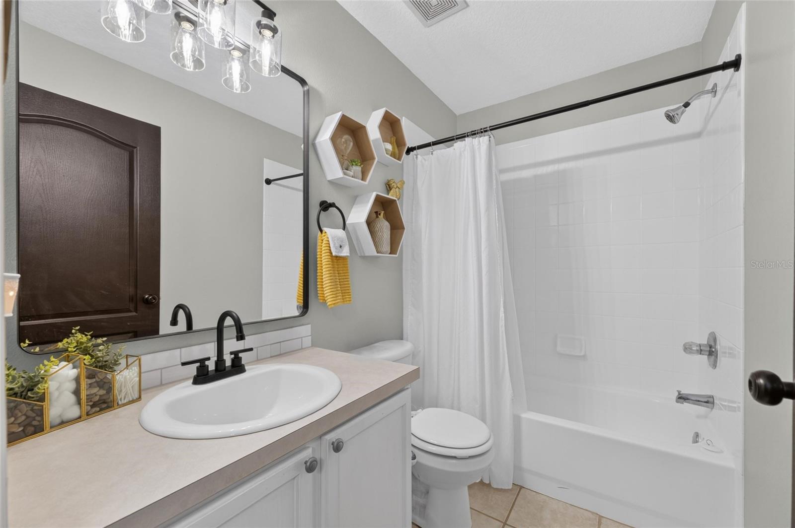 7629 DEVONBRIDGE GARDEN WAY — photo 43