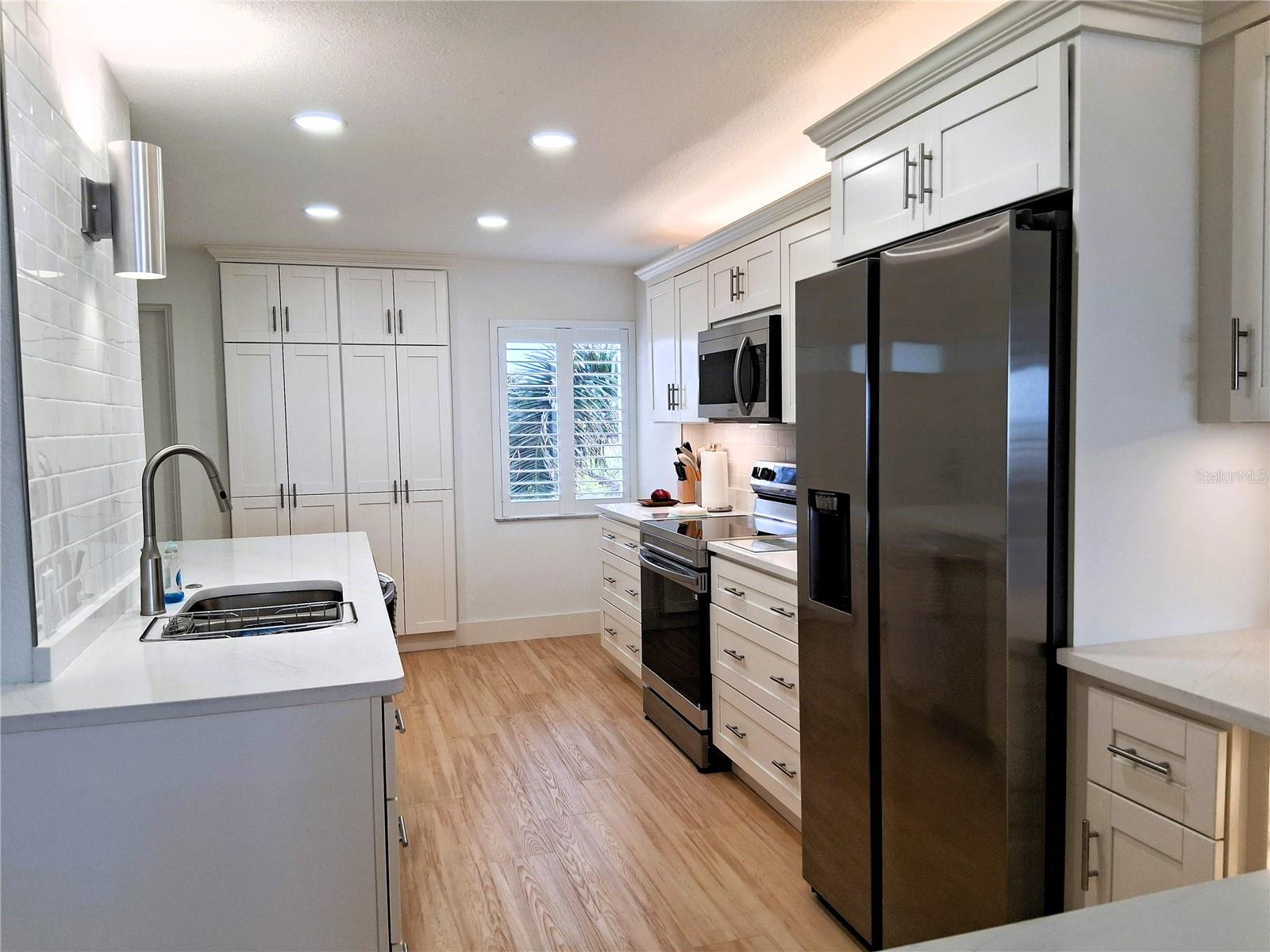 19 WHISPERING SANDS DR #401 — photo 18
