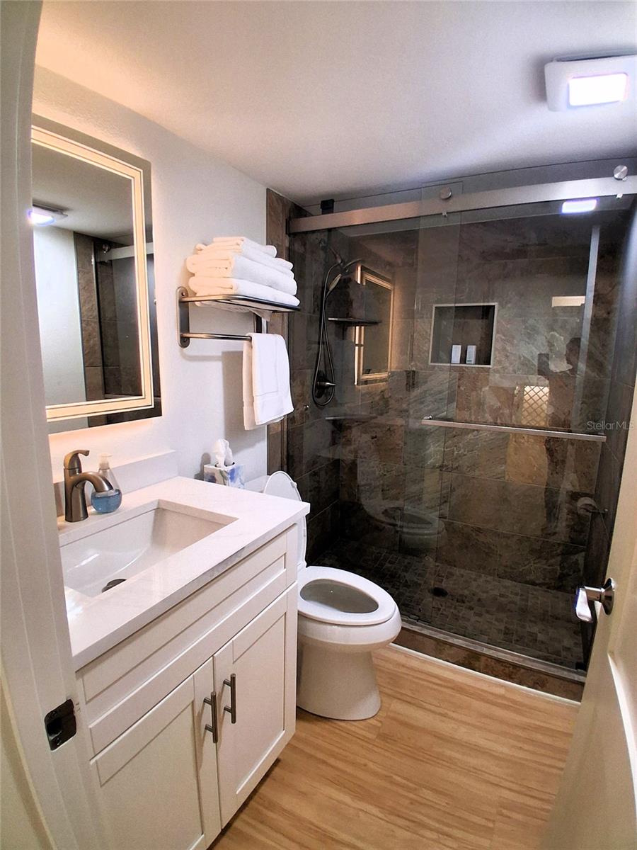 19 WHISPERING SANDS DR #401 — photo 32