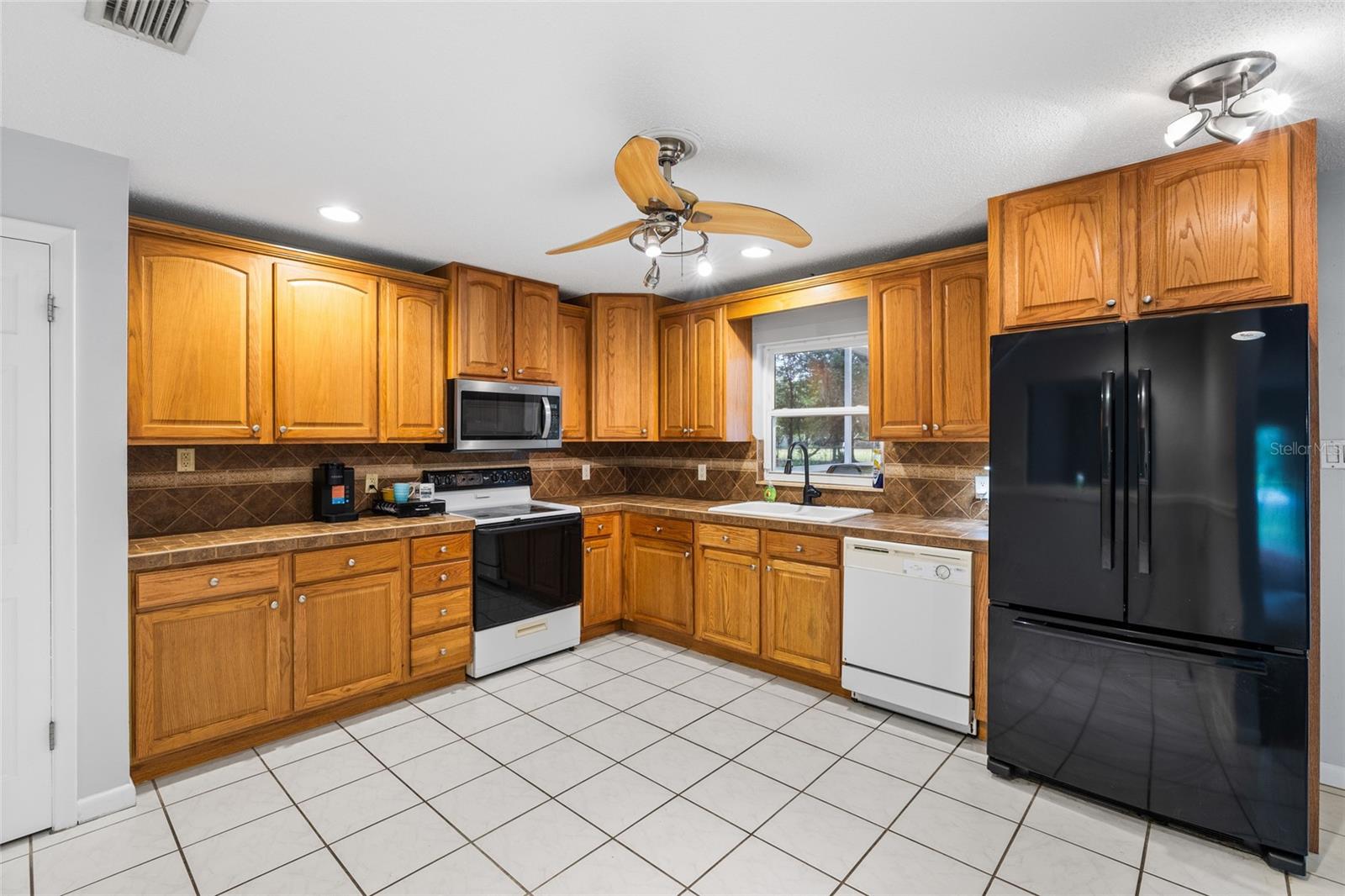 7402 W KNIGHTS GRIFFIN RD — photo 12