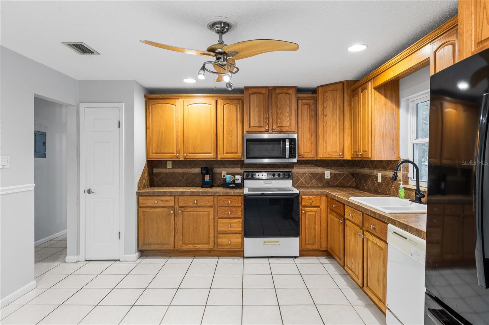 7402 W KNIGHTS GRIFFIN RD — photo 11
