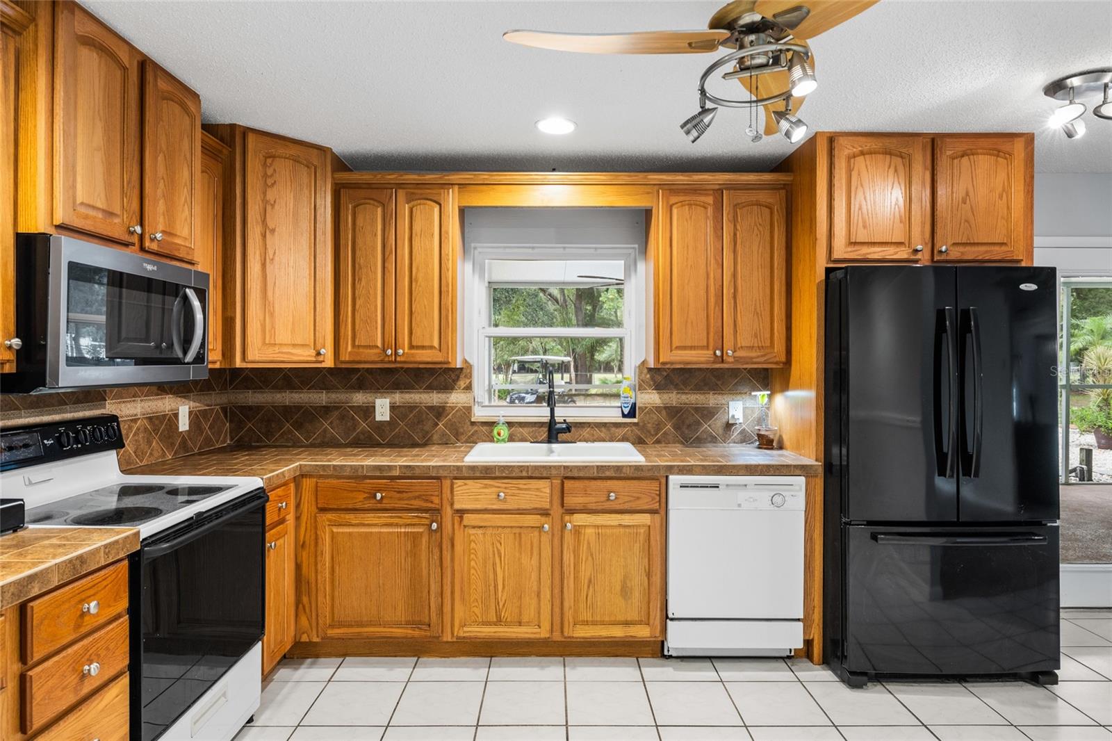 7402 W KNIGHTS GRIFFIN RD — photo 13