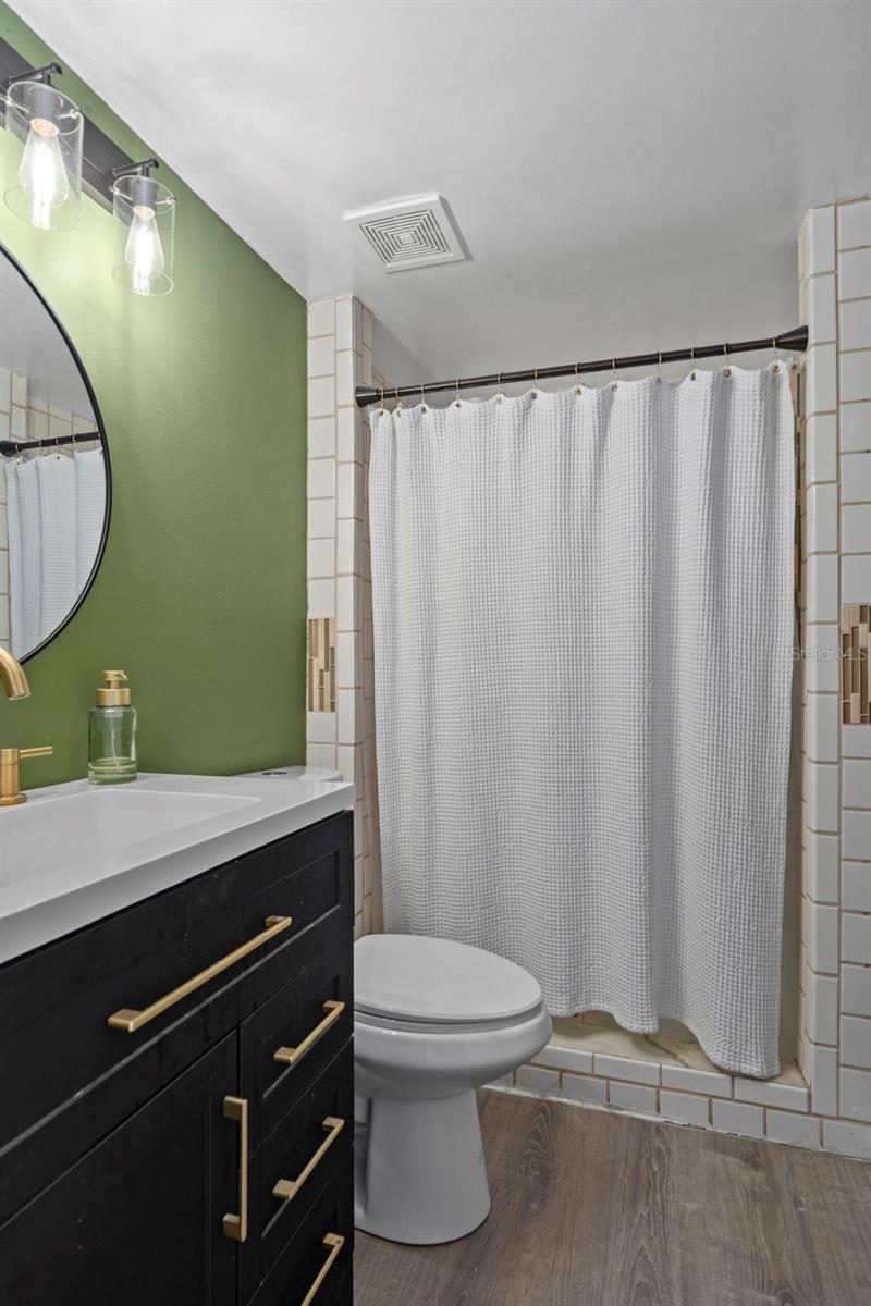 6917 DUNNETT AVE N — photo 32