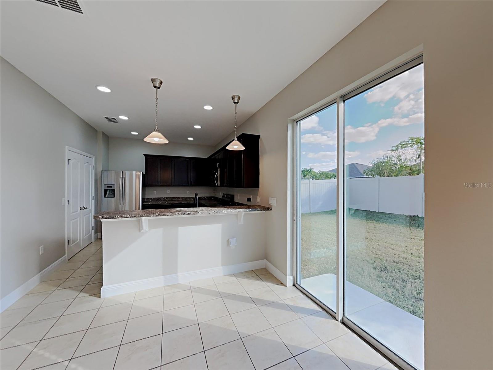 7033 FEATHER WOOD DR — photo 11