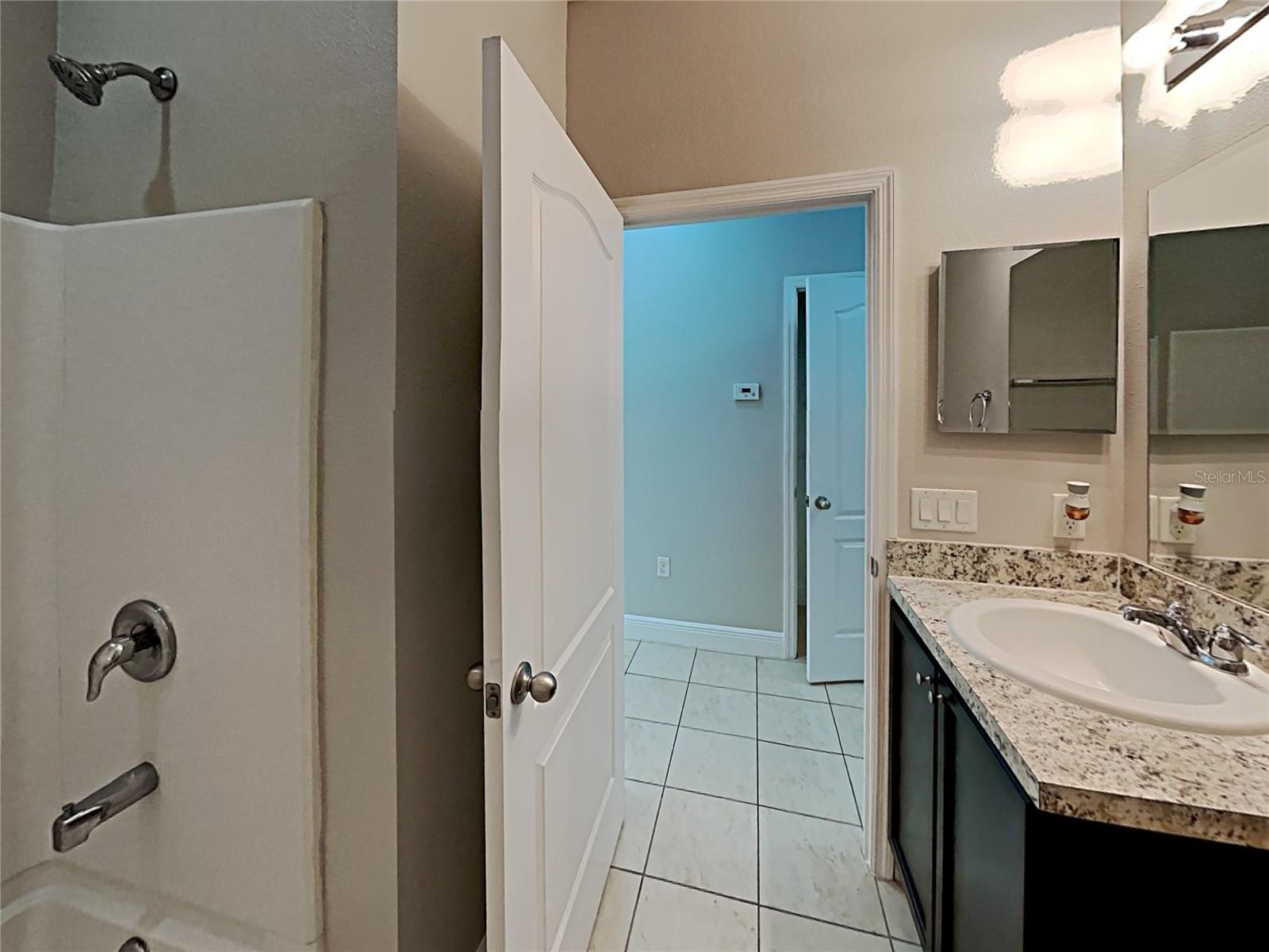 7033 FEATHER WOOD DR — photo 4