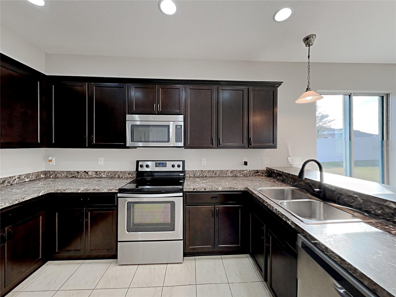 7033 FEATHER WOOD DR — photo 12
