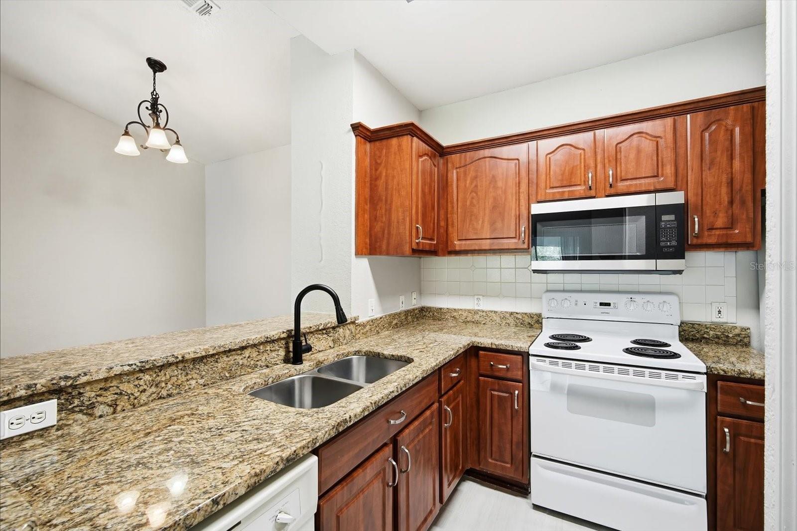 5703 LEGACY CRESCENT PL #301 — photo 8