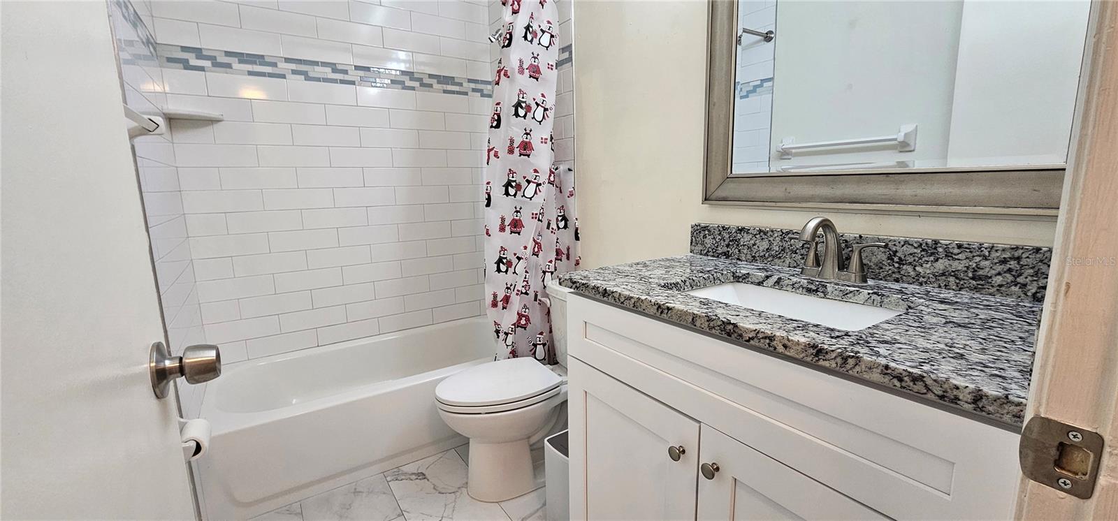 1712 BELLEAIR FOREST DR #A — photo 6