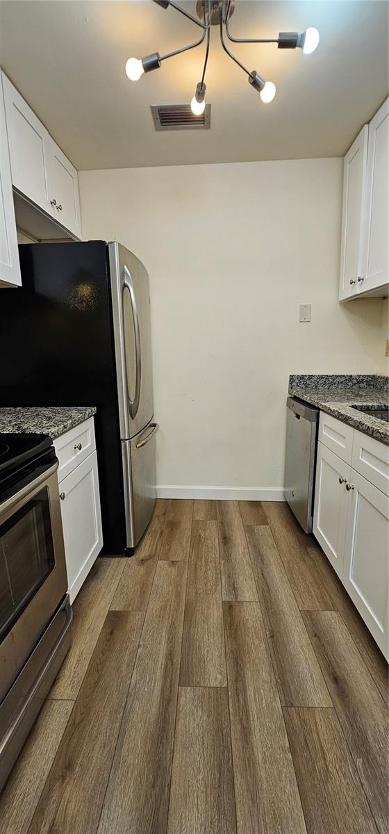 1712 BELLEAIR FOREST DR #A — photo 11