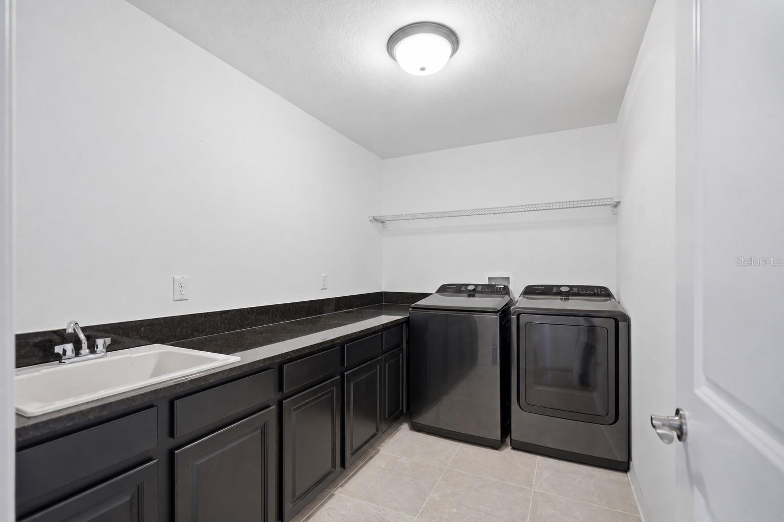 9307 PARISIAN CT — photo 32