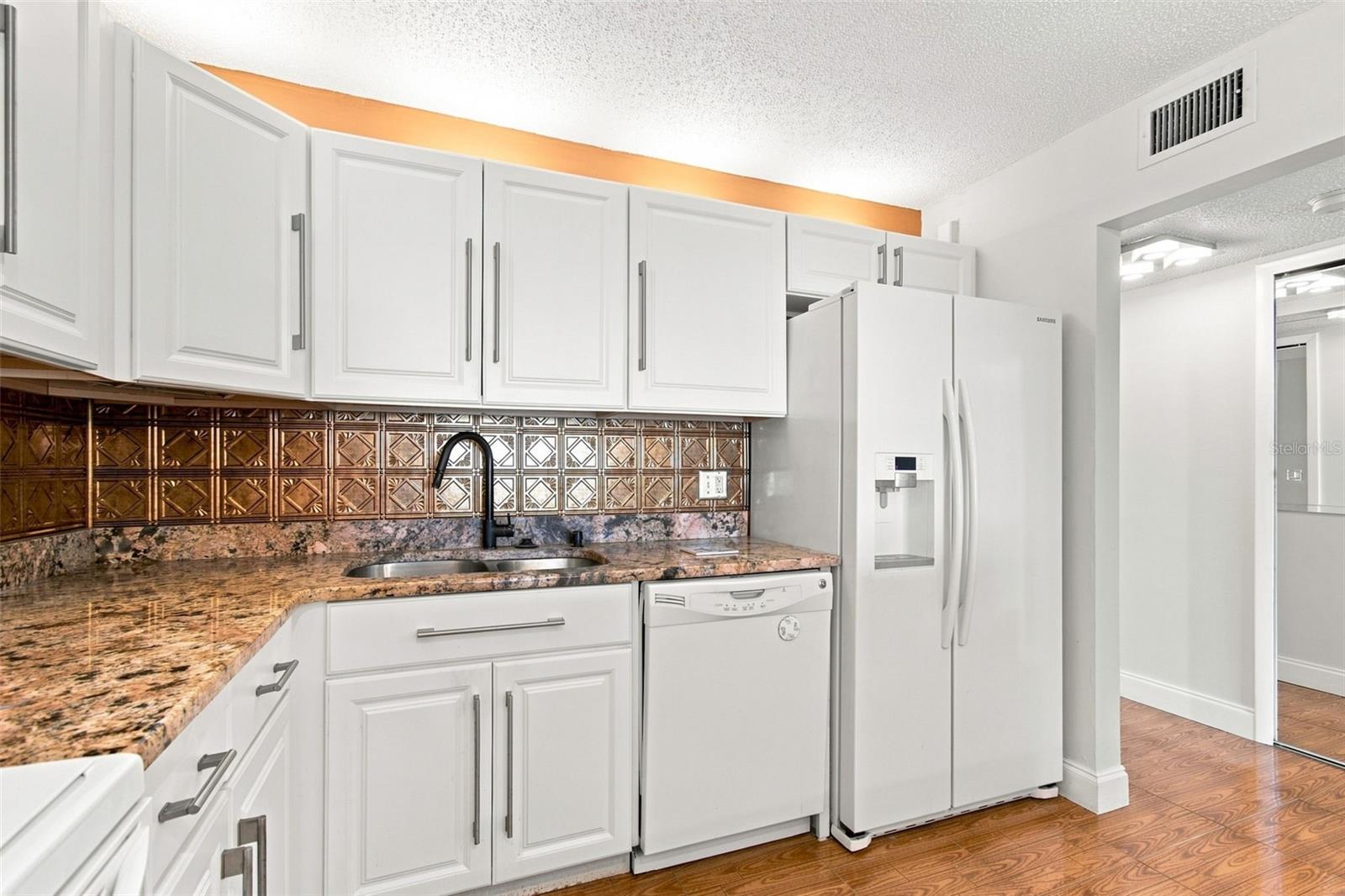 7700 SUN ISLAND DR S #202 — photo 12