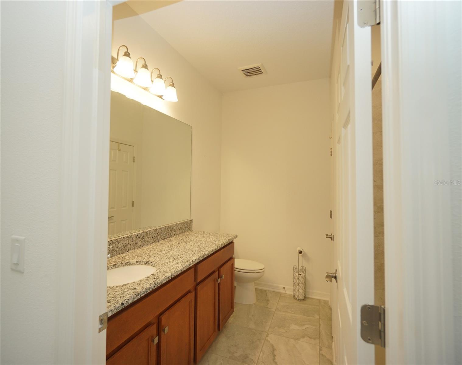 7076 GULF CYPRESS AVE — photo 10