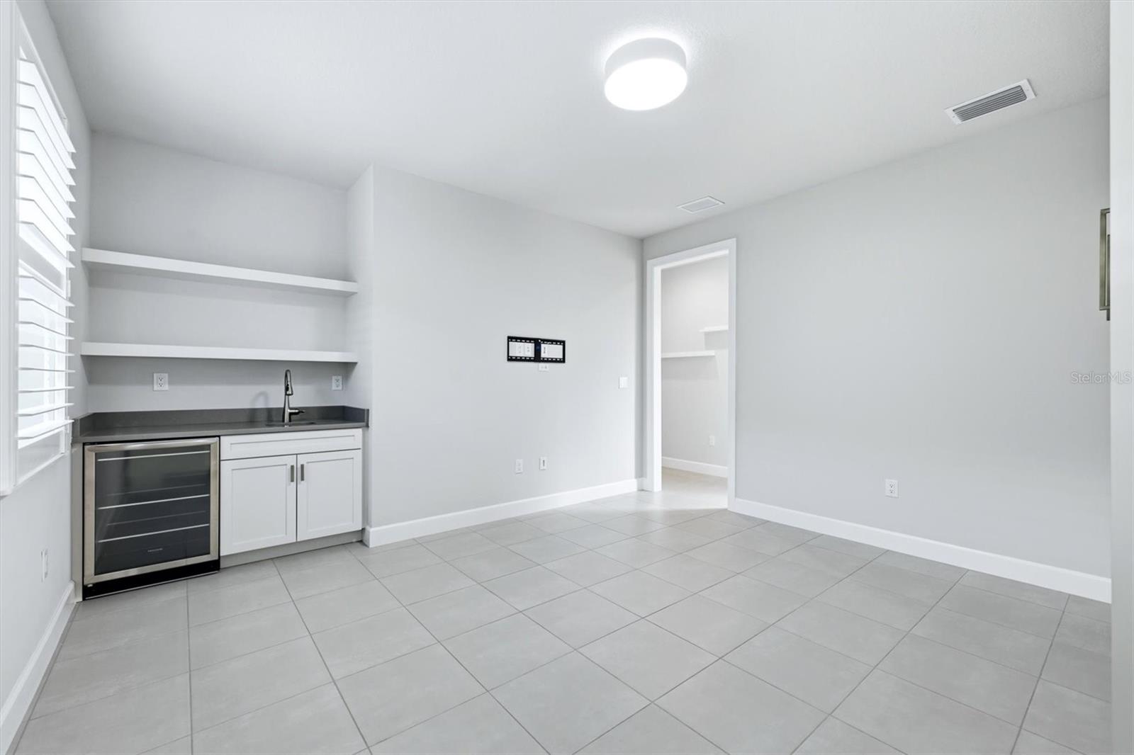 7717 SANDHILL LAKE DR — photo 32