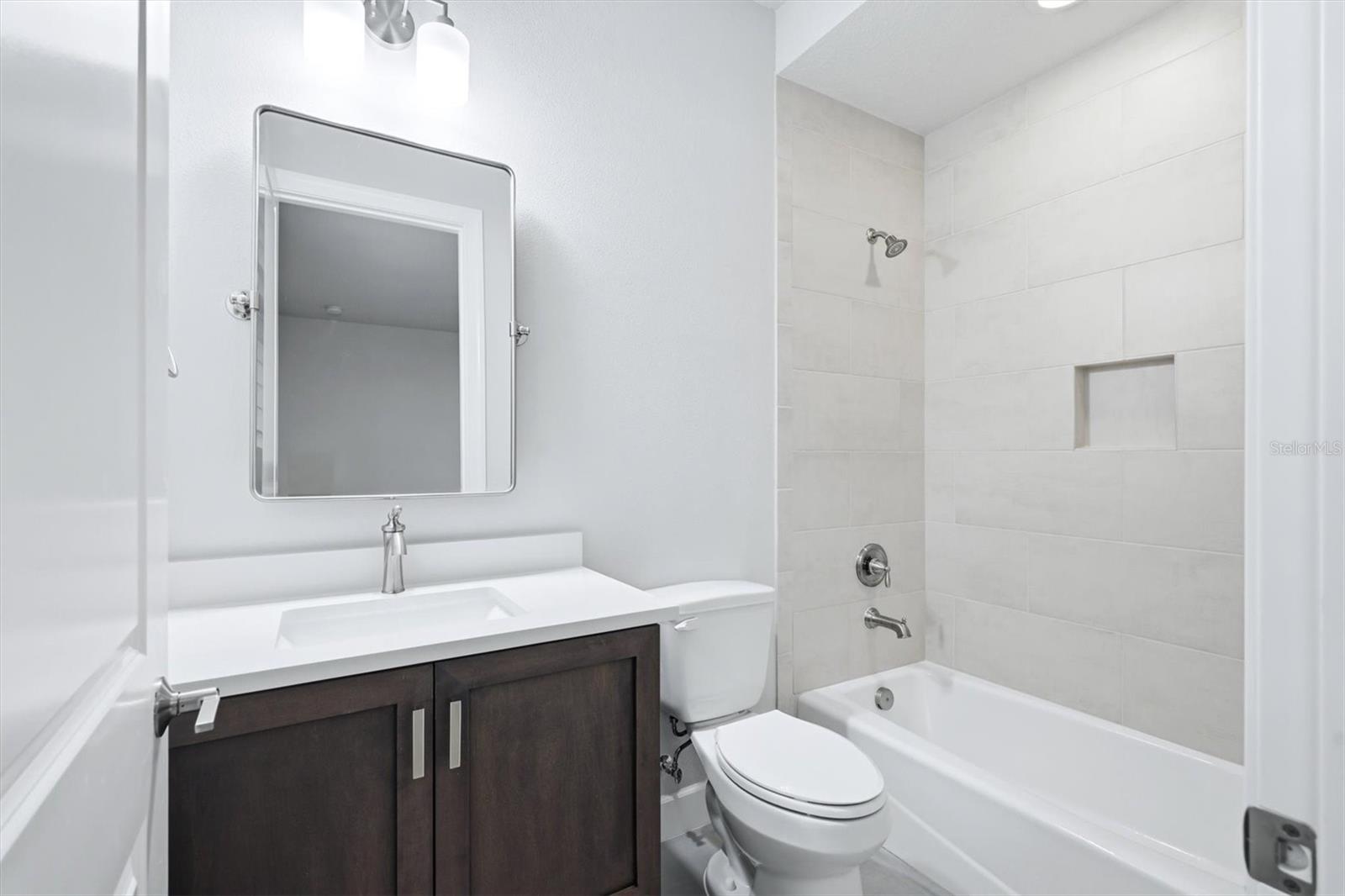 7717 SANDHILL LAKE DR — photo 29