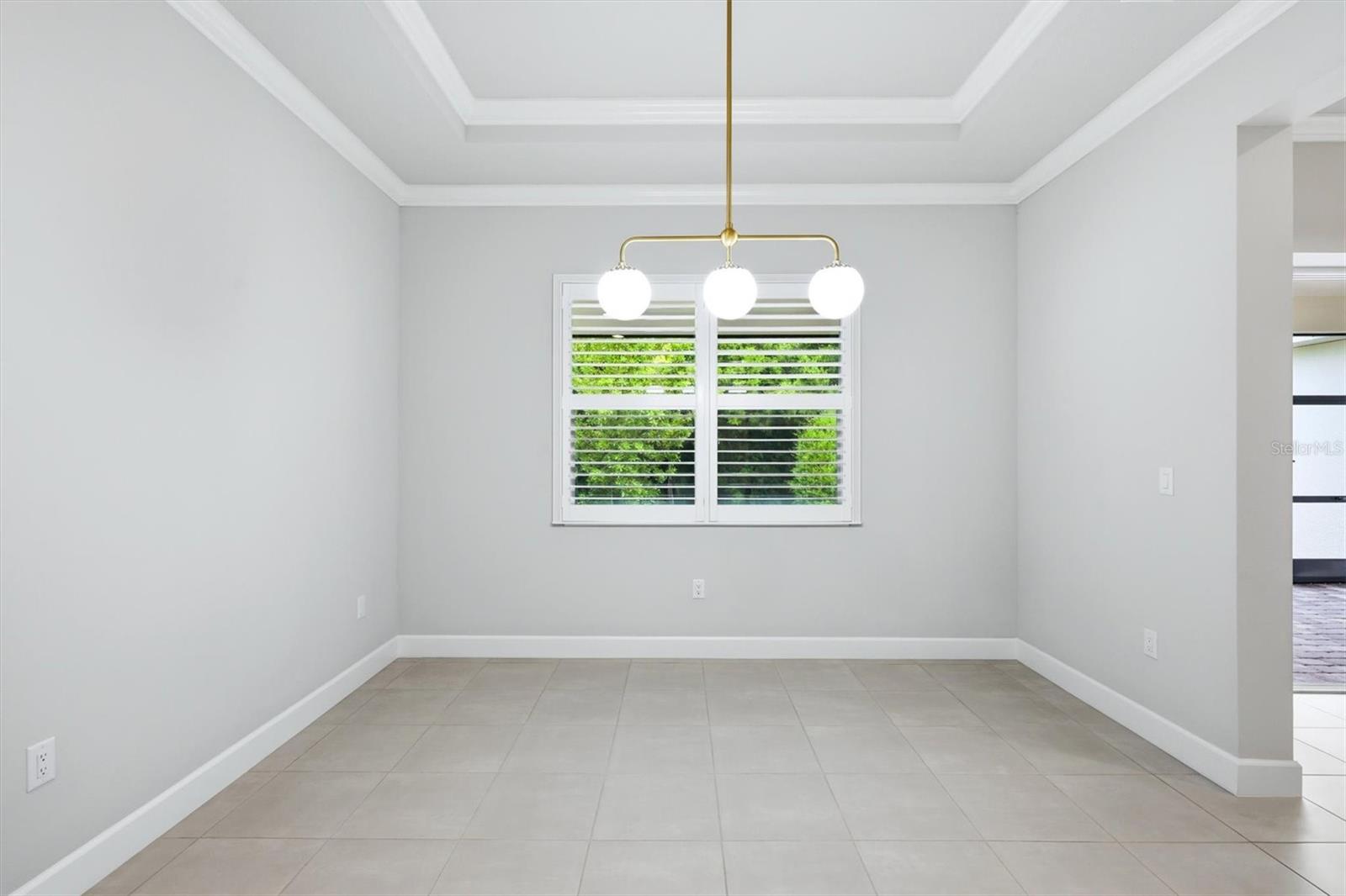 7717 SANDHILL LAKE DR — photo 18