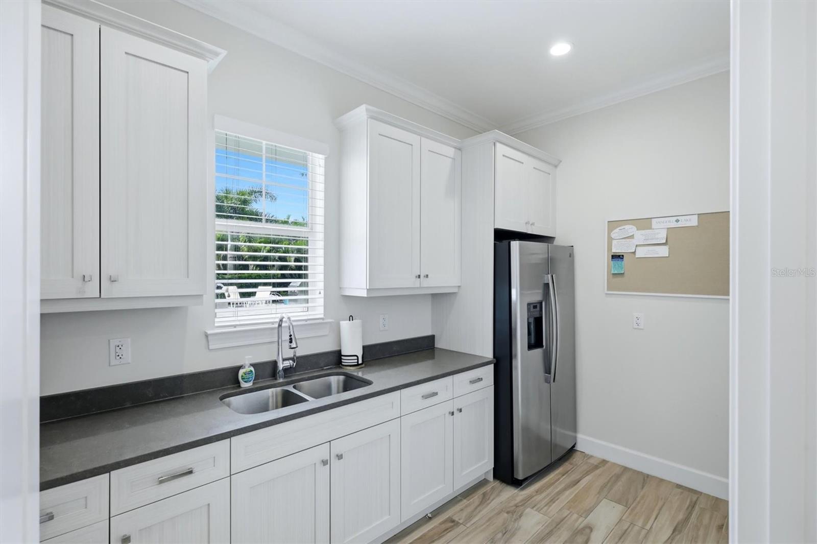 7717 SANDHILL LAKE DR — photo 53