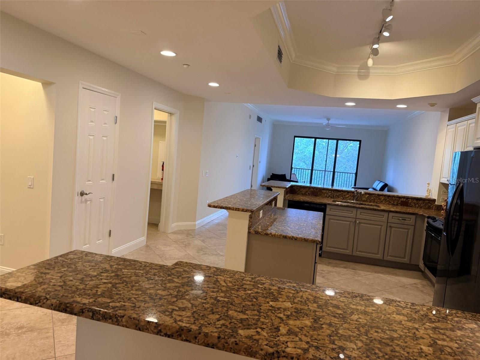 7702 LAKE VISTA CT #303 — photo 9