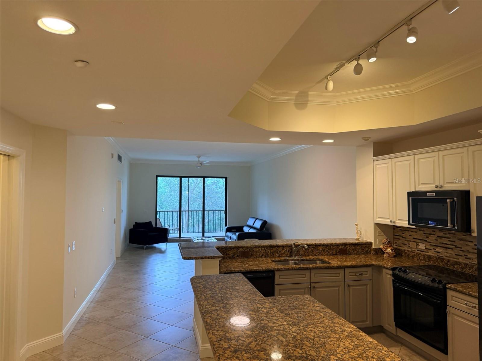 7702 LAKE VISTA CT #303 — photo 10