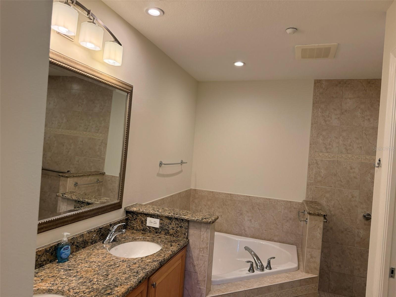 7702 LAKE VISTA CT #303 — photo 30