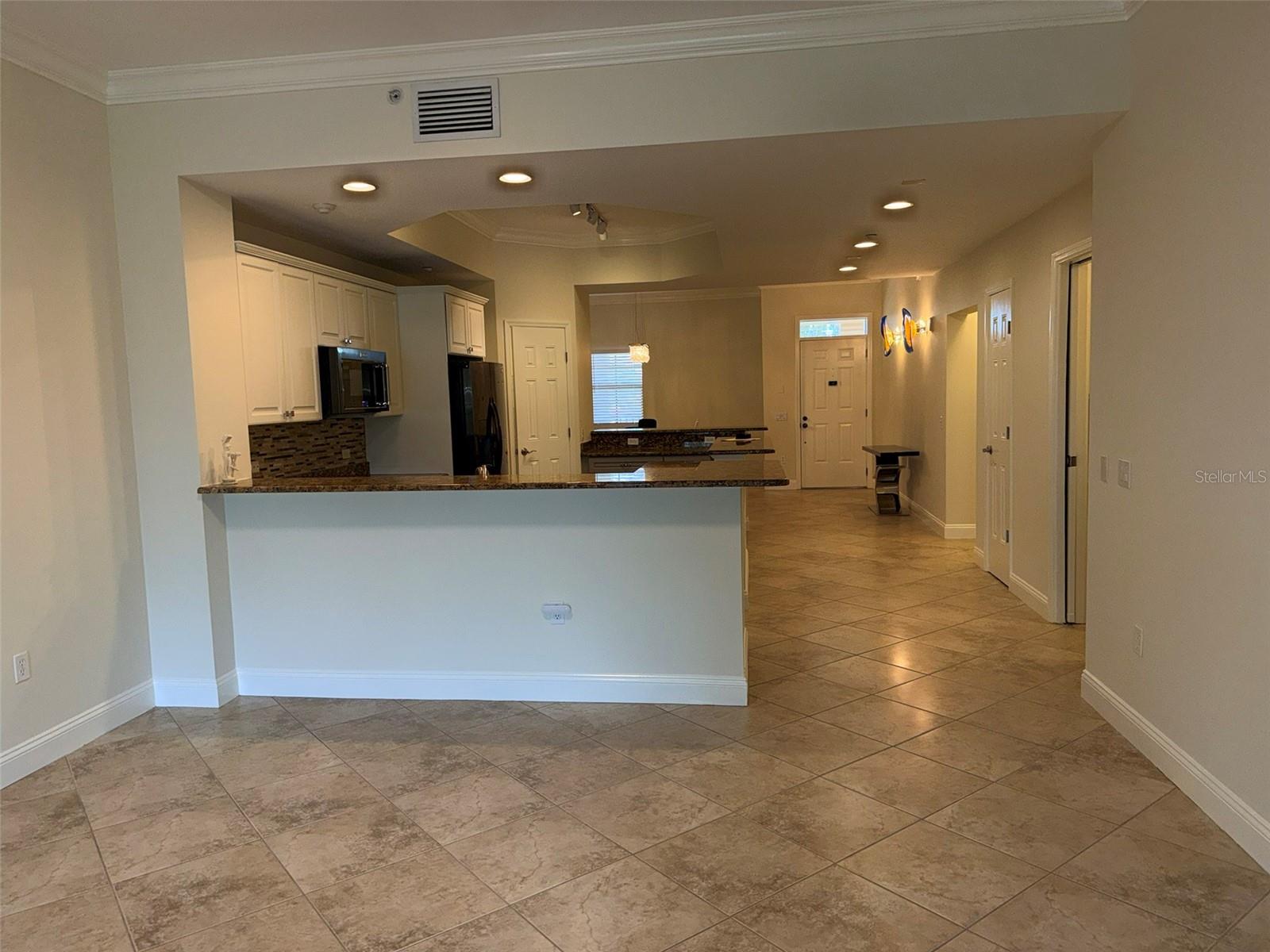 7702 LAKE VISTA CT #303 — photo 18