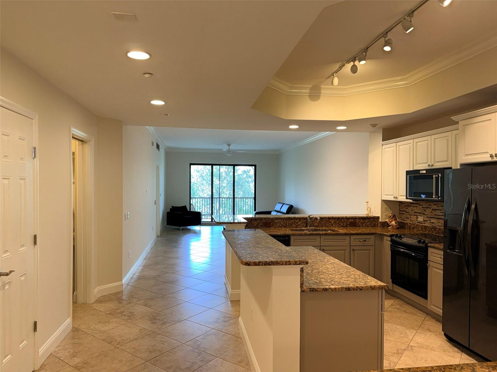 7702 LAKE VISTA CT #303 — photo 8