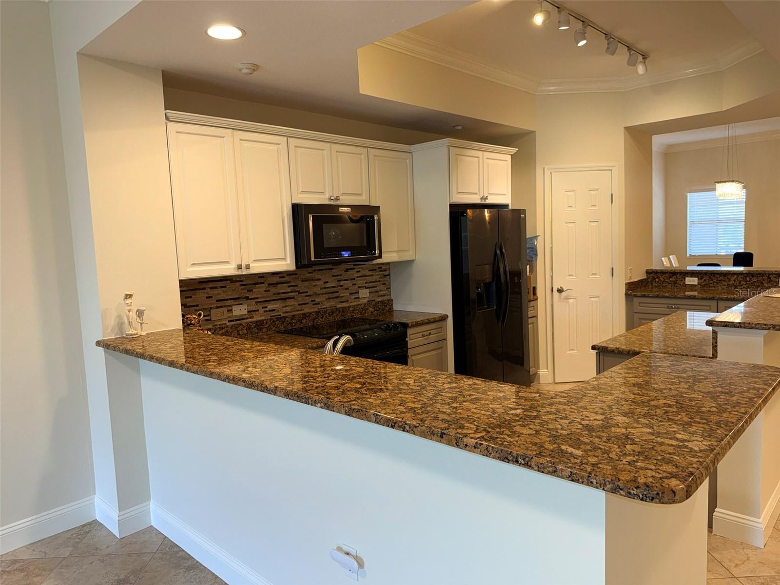 7702 LAKE VISTA CT #303 — photo 12