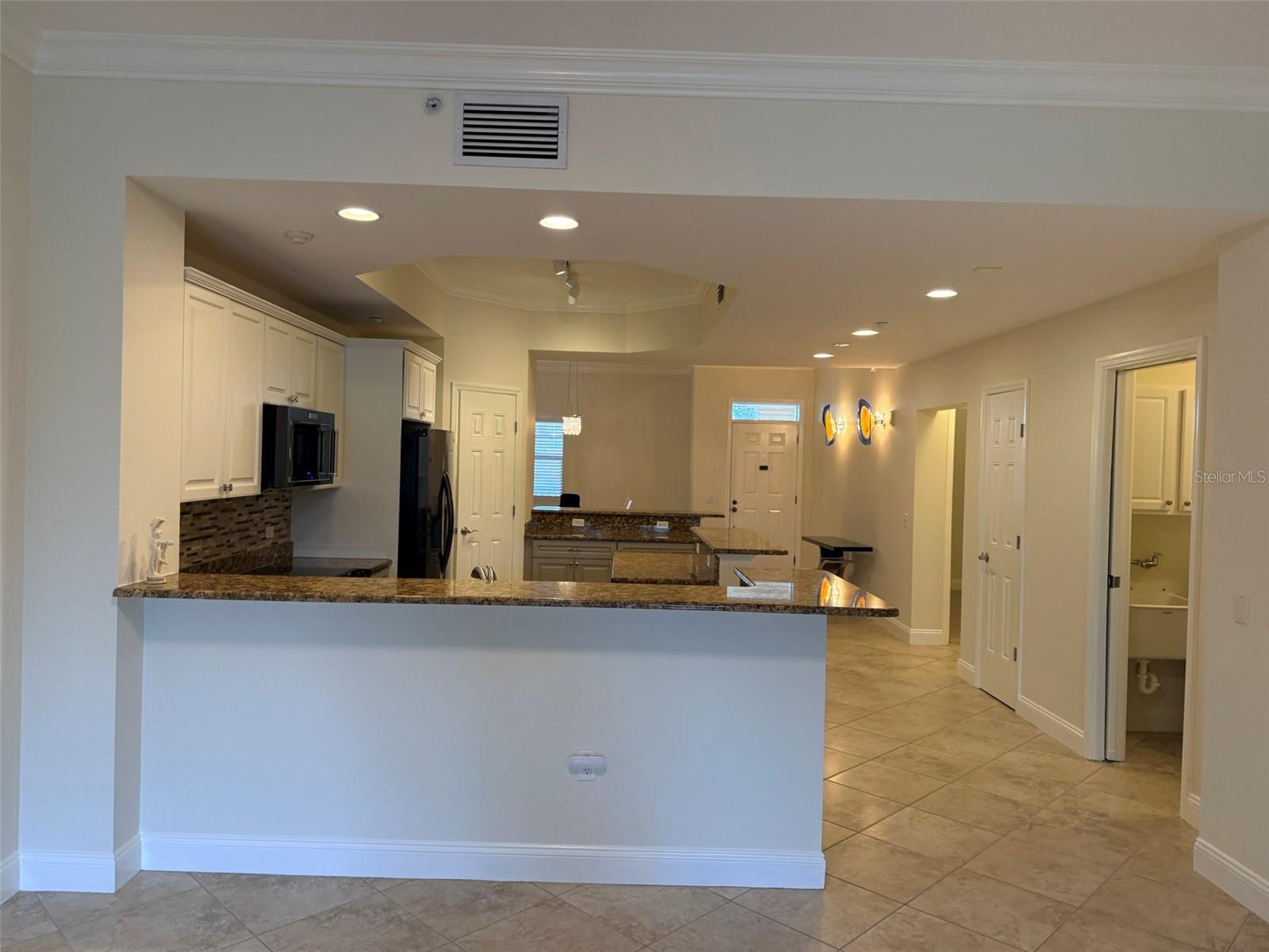 7702 LAKE VISTA CT #303 — photo 13