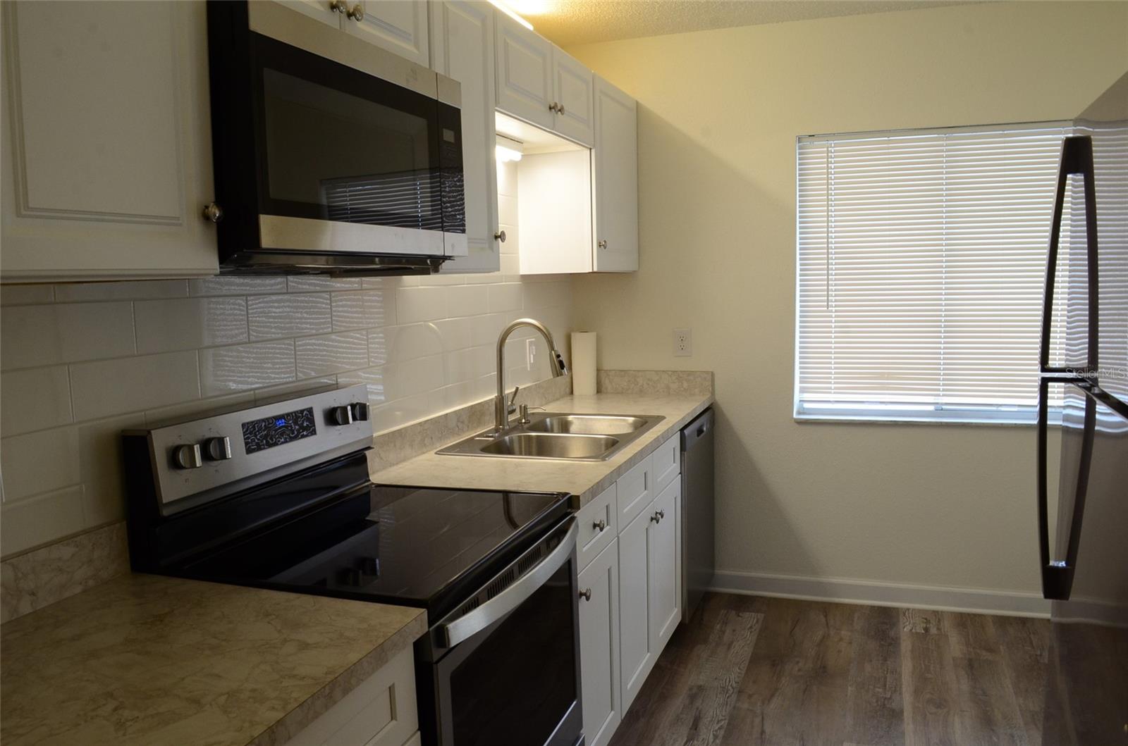 4435 1ST ST NE #111 — photo 2