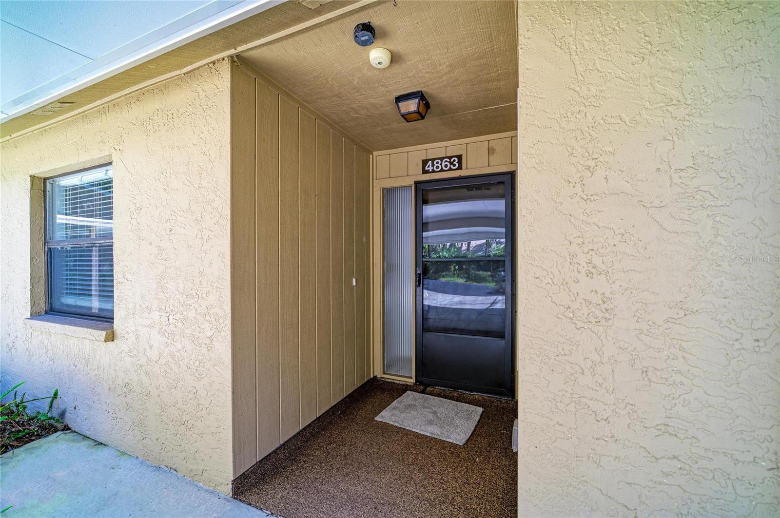 4863 VILLAGE GARDENS DR #186 — photo 2