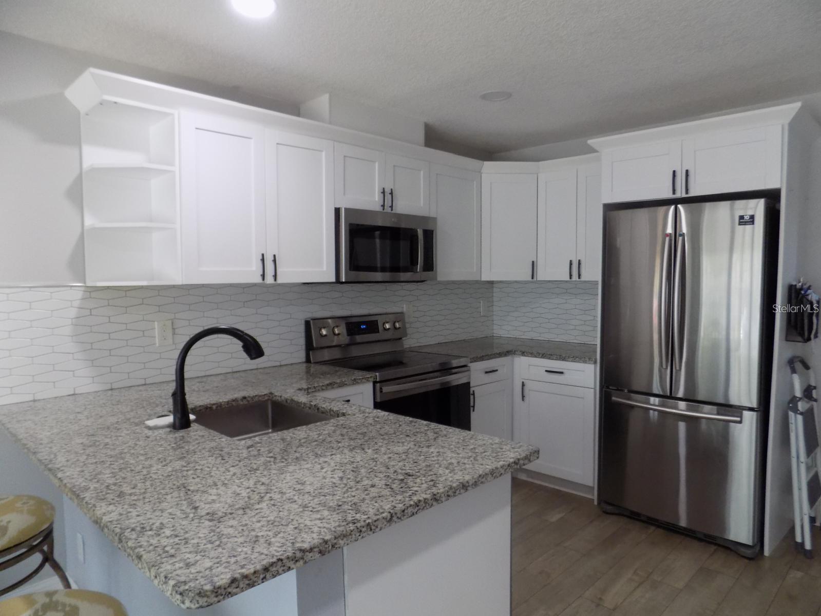 1306 E 27TH AVE — photo 5